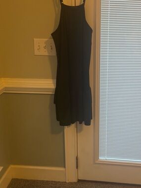 Black mini dress with adjustable straps,